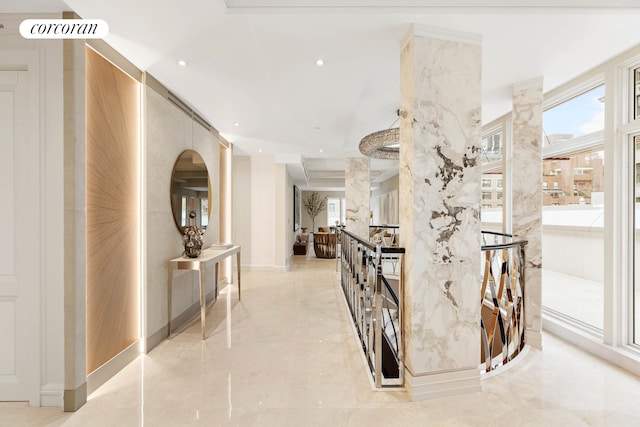 corridor with recessed lighting and a healthy amount of sunlight