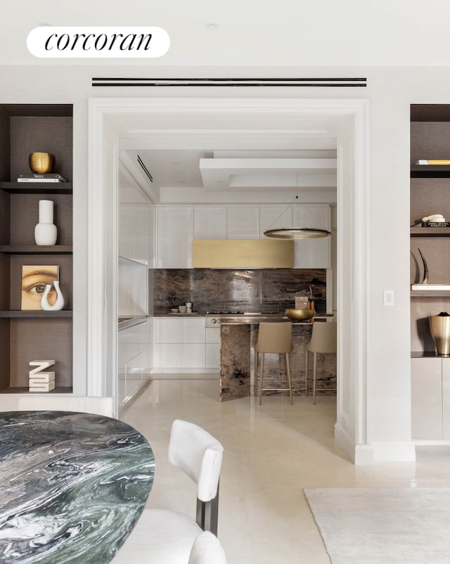interior space featuring built in shelves
