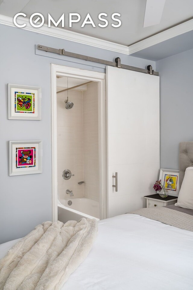 155 E 49th St Unit 10E, New York City, NY 10017 - bedroom with a barn door