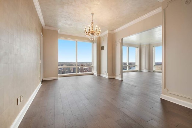 carpeted empty room with ornamental molding and a water view