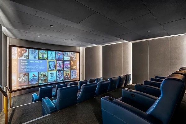 home theater room featuring a decorative wall