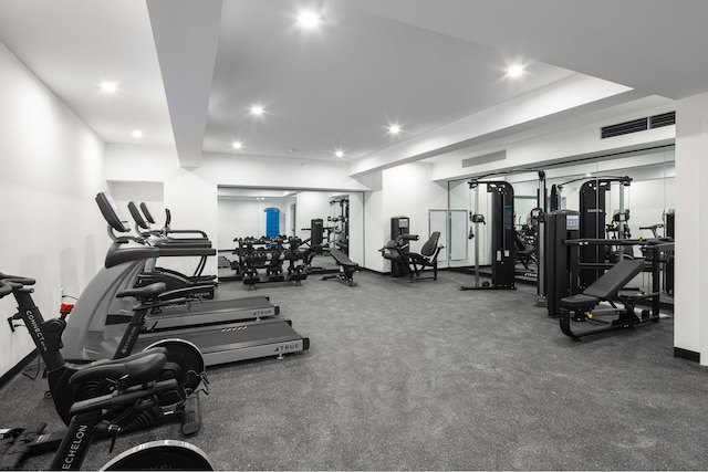 gym with recessed lighting and visible vents