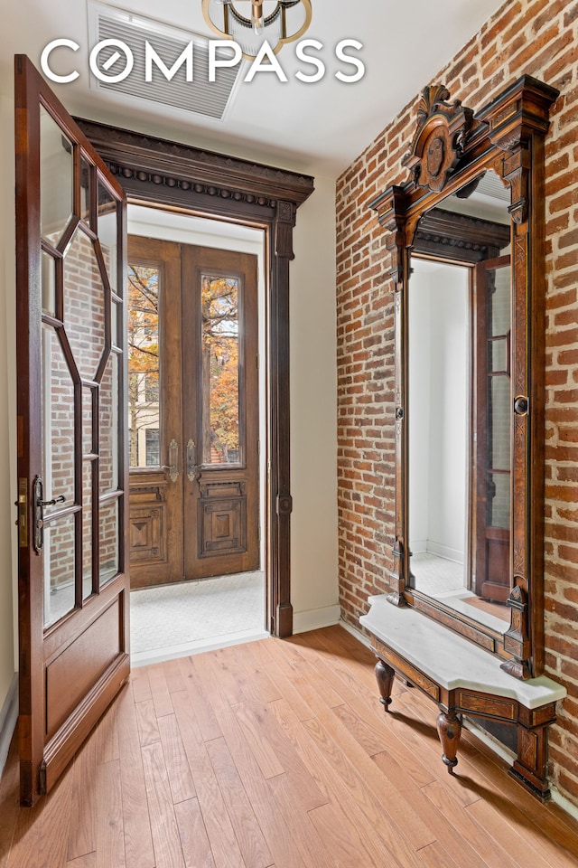 interior space with visible vents and french doors