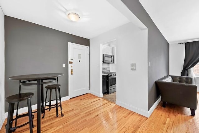 entryway with light wood-type flooring