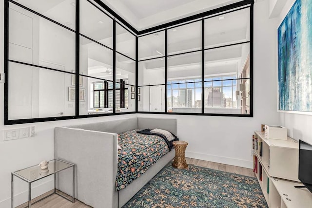 bedroom featuring light wood-type flooring