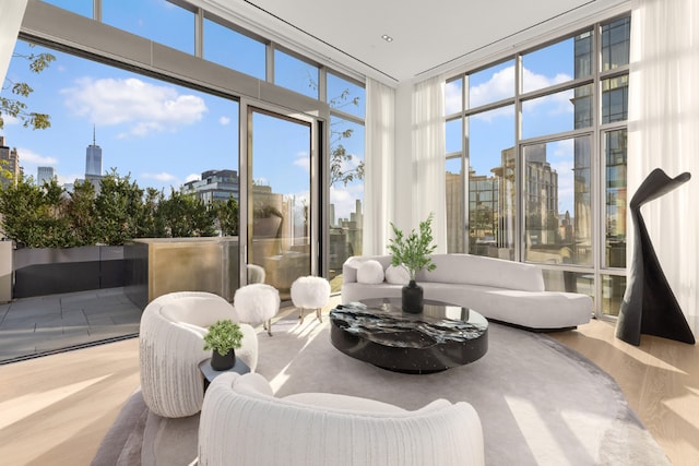 sunroom featuring a view of city