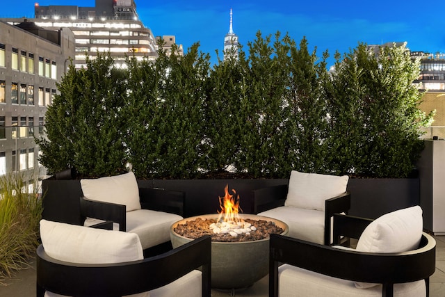 view of patio / terrace featuring a fire pit