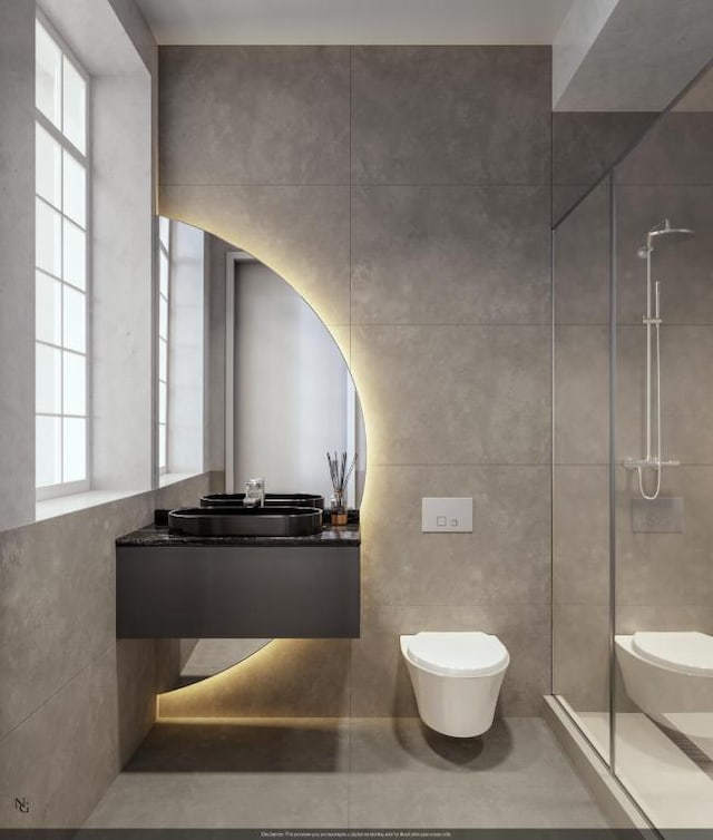 bathroom with a wealth of natural light, tile walls, and toilet