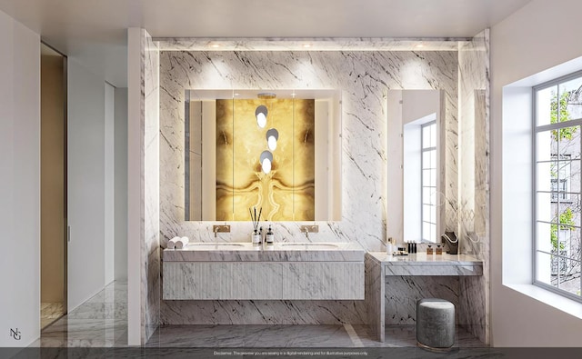 full bath with stone wall, marble finish floor, and double vanity