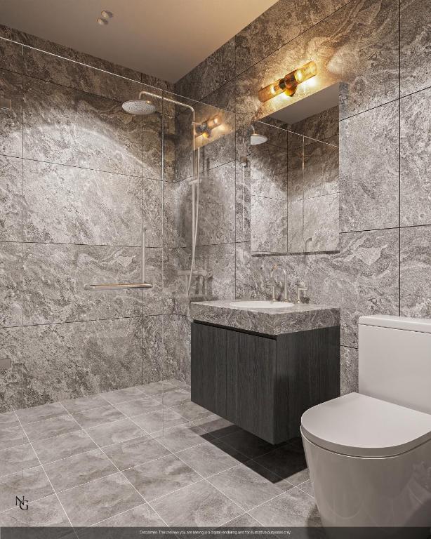 bathroom with vanity, tiled shower, tile walls, and toilet