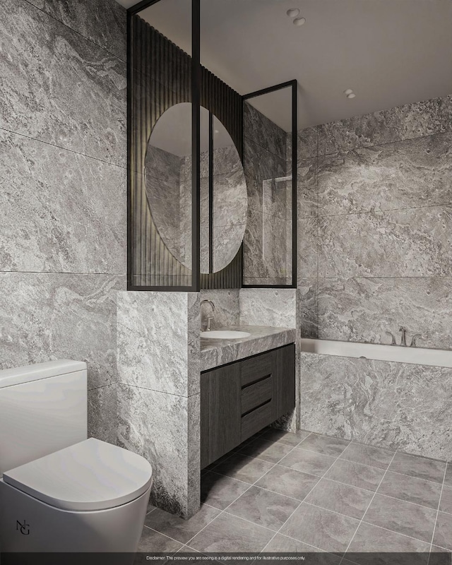 bathroom with tile walls, vanity, and toilet