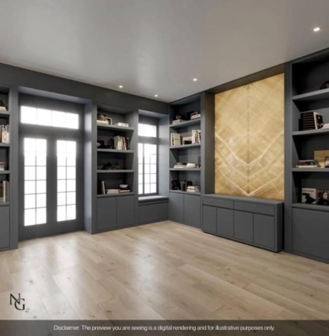 interior space featuring french doors, built in shelves, and light hardwood / wood-style flooring