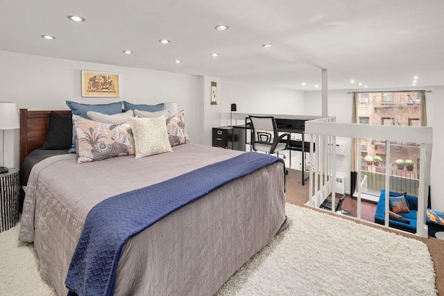 bedroom with light colored carpet