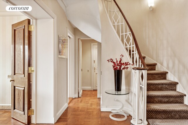 stairs featuring visible vents and baseboards