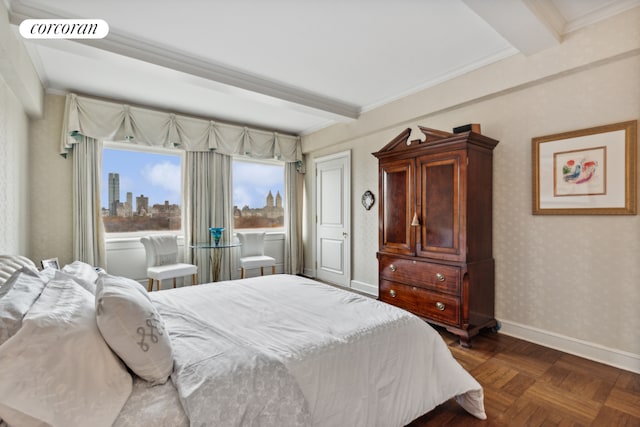 bedroom featuring baseboards, a view of city, beam ceiling, and wallpapered walls