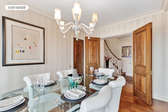 dining space with crown molding, visible vents, wallpapered walls, a chandelier, and stairs