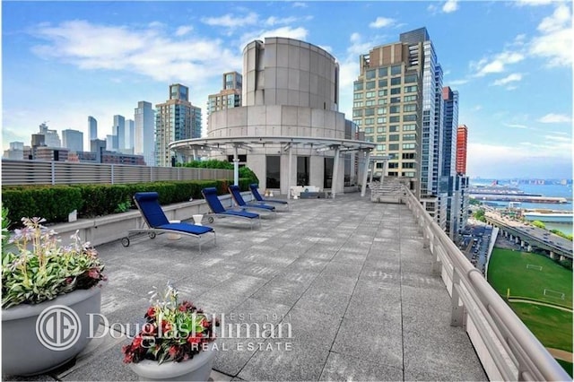 view of patio / terrace featuring a water view