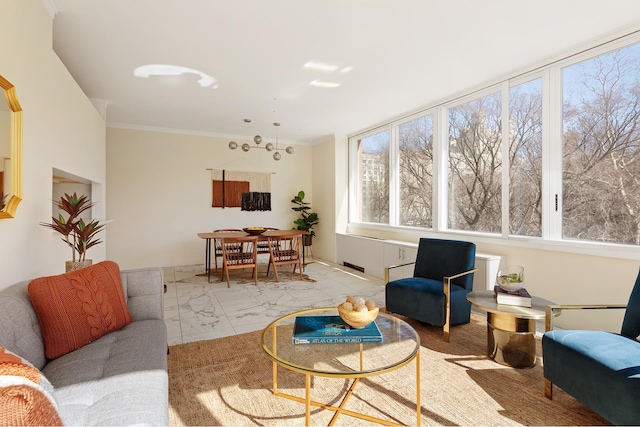 living area featuring ornamental molding and marble finish floor