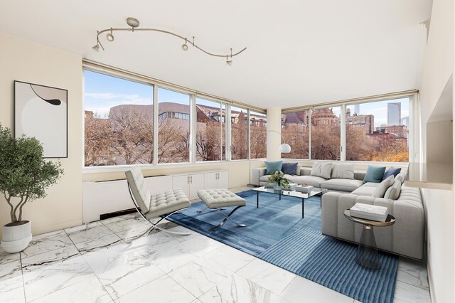 unfurnished sunroom featuring a wealth of natural light