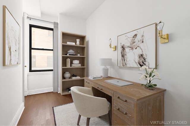 home office featuring dark wood finished floors and baseboards