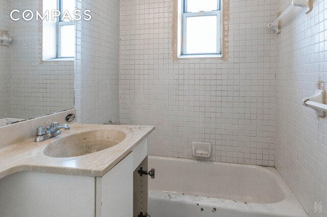 full bathroom featuring shower / tub combination and vanity