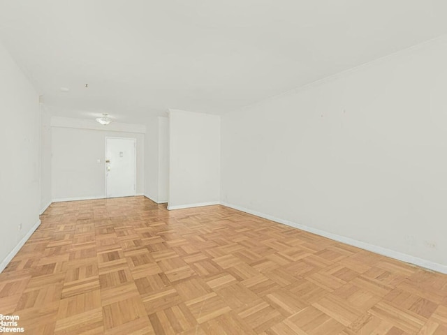 empty room with baseboards