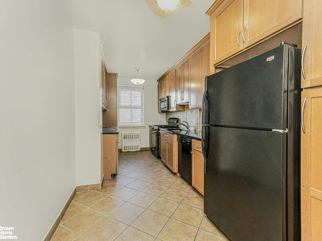 kitchen featuring light tile patterned floors, black appliances, tasteful backsplash, radiator heating unit, and dark countertops