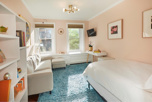 bedroom featuring carpet floors, ornamental molding, and an inviting chandelier