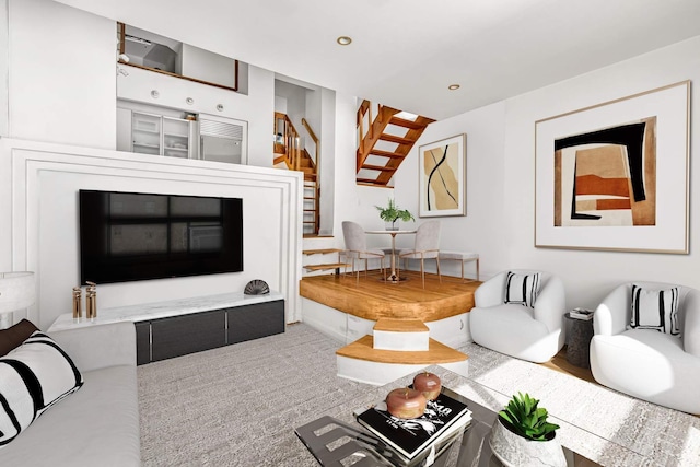 living room with recessed lighting and stairs