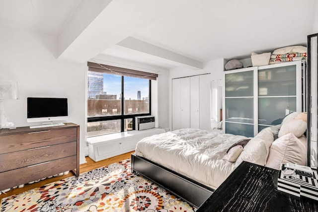 bedroom featuring light wood finished floors