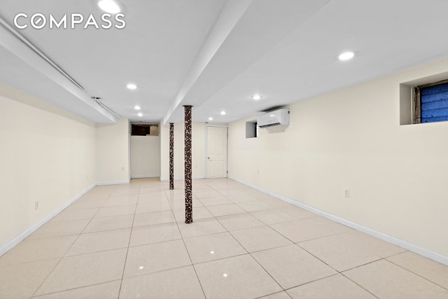 945 E 32nd St, New York City, NY 11210 - finished basement featuring a wall unit AC, recessed lighting, and baseboards