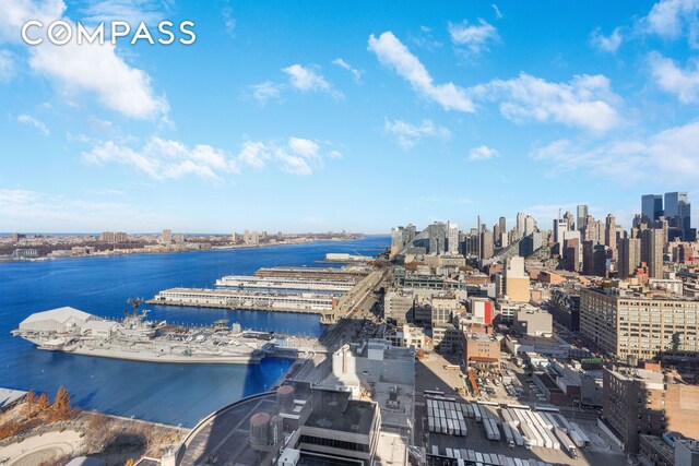 bird's eye view with a water view and a city view