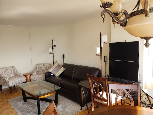 living room with light parquet floors and ornamental molding