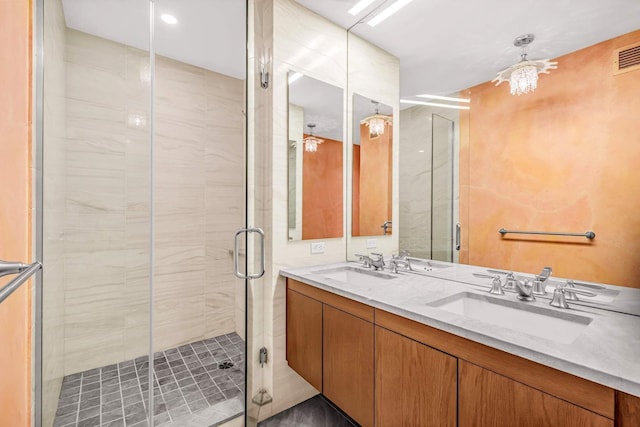 333 E 91st St Unit 31Cd, New York City, NY 10128 - bathroom with a stall shower and double vanity
