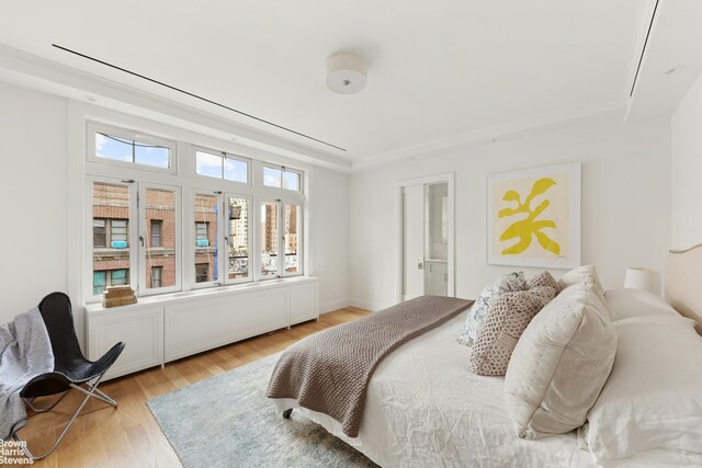 bedroom featuring light hardwood / wood-style floors