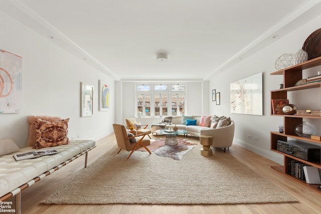 living area with light hardwood / wood-style floors