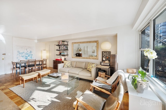 living room featuring parquet floors