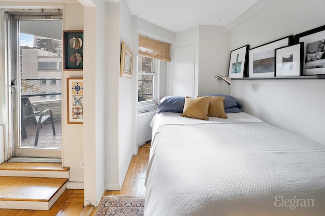 bedroom featuring multiple windows