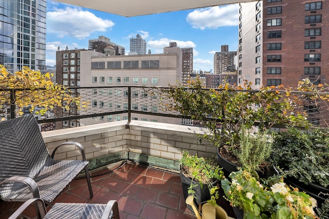 balcony featuring a city view