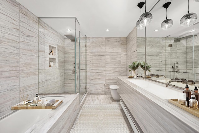 full bath with toilet, a marble finish shower, tile walls, and vanity