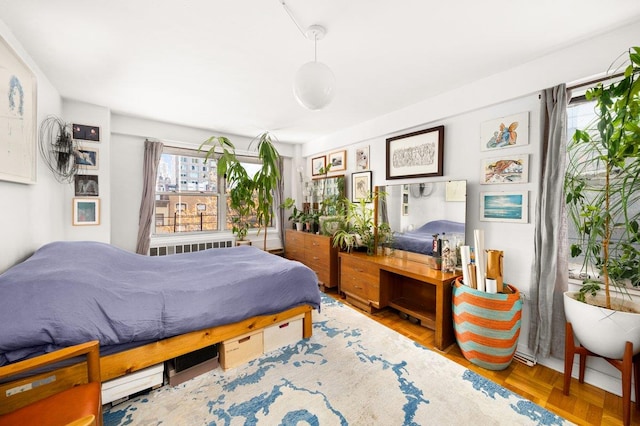 bedroom with radiator heating unit