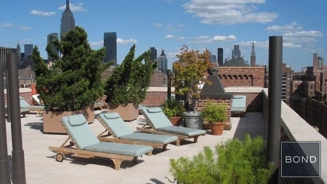 view of patio / terrace with a balcony