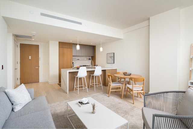 living area with light wood-style flooring