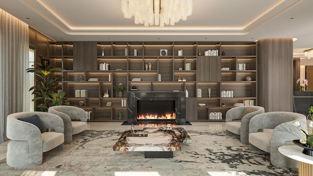 living area featuring a raised ceiling and a warm lit fireplace