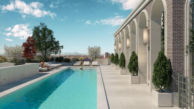 view of pool with a patio area and a fenced in pool