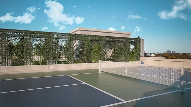 view of sport court featuring fence