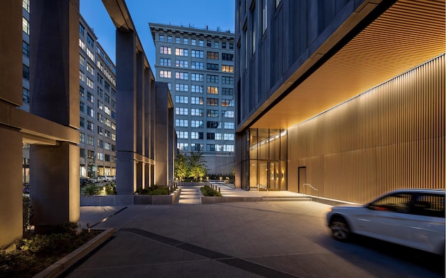 view of road featuring sidewalks and a view of city