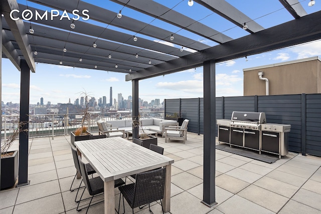 440 Kent Ave Unit 18F, New York City, NY 11249 - view of patio / terrace with an outdoor living space, a pergola, grilling area, and a skyline view