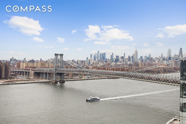 440 Kent Ave Unit 18F, New York City, NY 11249 - water view featuring a notable bridge and skyline