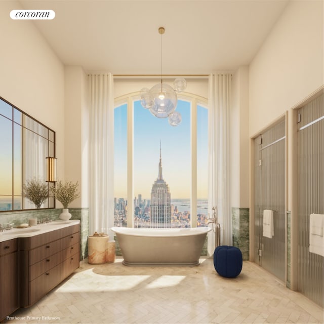 bathroom featuring a high ceiling, vanity, and independent shower and bath